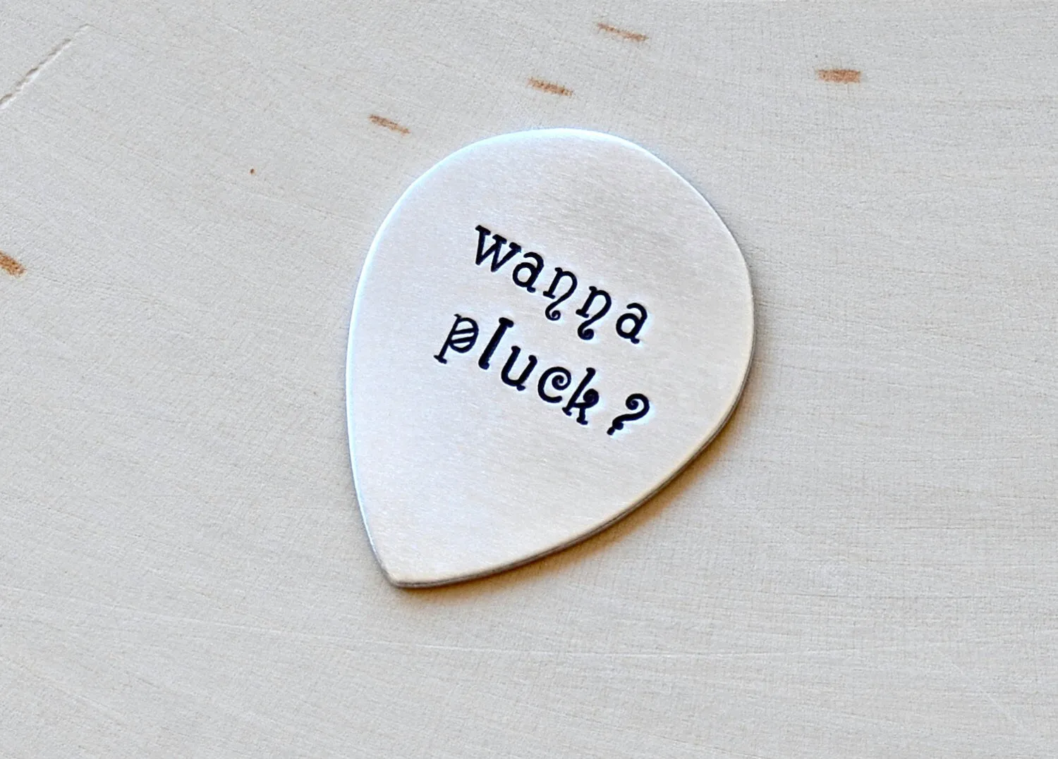 Wanna pluck teardrop\ jazz style guitar pick in aluminum