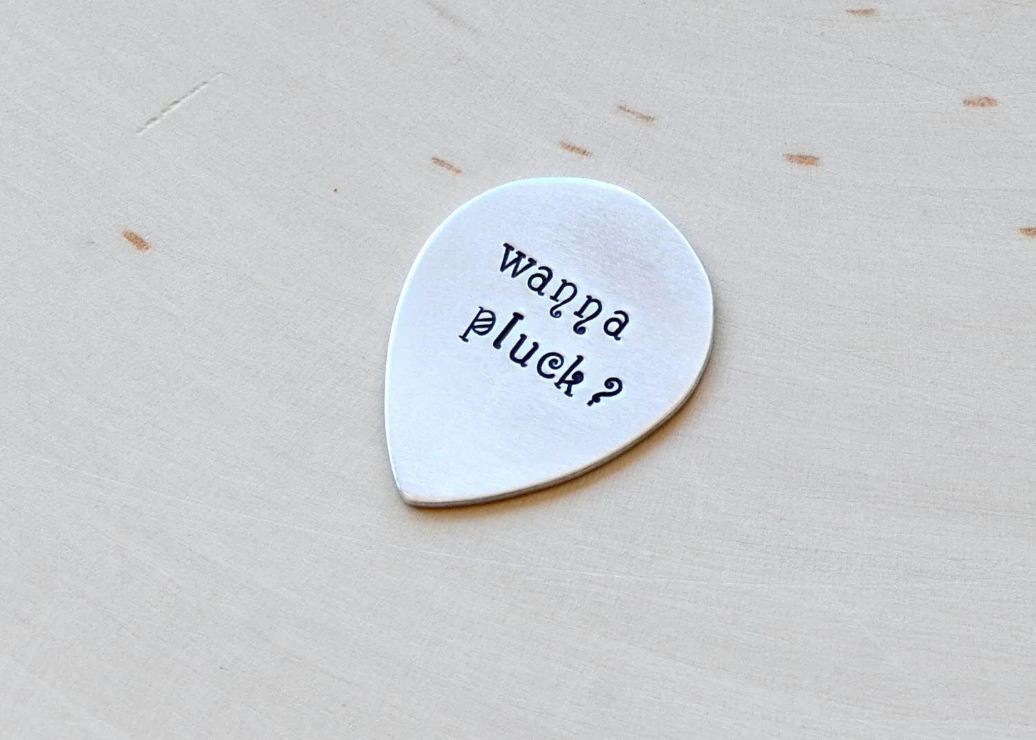 Wanna pluck teardrop\ jazz style guitar pick in aluminum